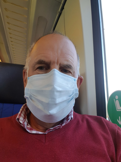 in-the-train-with-mask.png