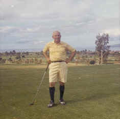 My father playing golf