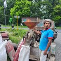 Yogjakarta - Grinding and bagging rice.