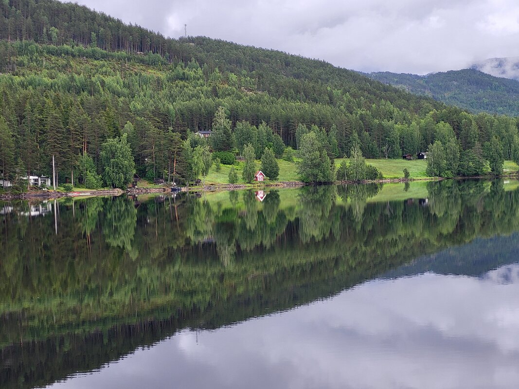 Vradal - The surface of the water is a perfect mirror.