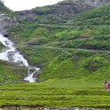 Road trip - Waterfall and small cabin.